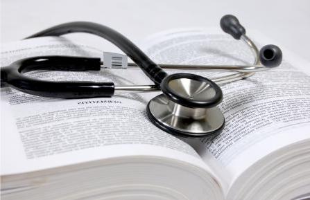 photo of stethoscope and book
